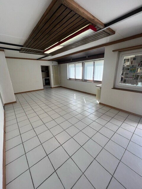 Local commercial de ~52 m2 au rez-de-chaussée à louer à Courtételle - photo 1