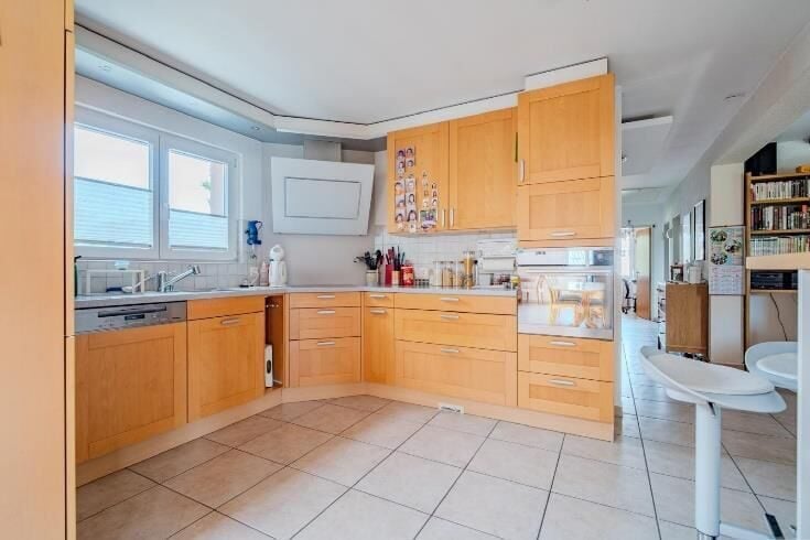 À vendre à Courroux spacieuse maison individuelle de 6 pièces - photo 4