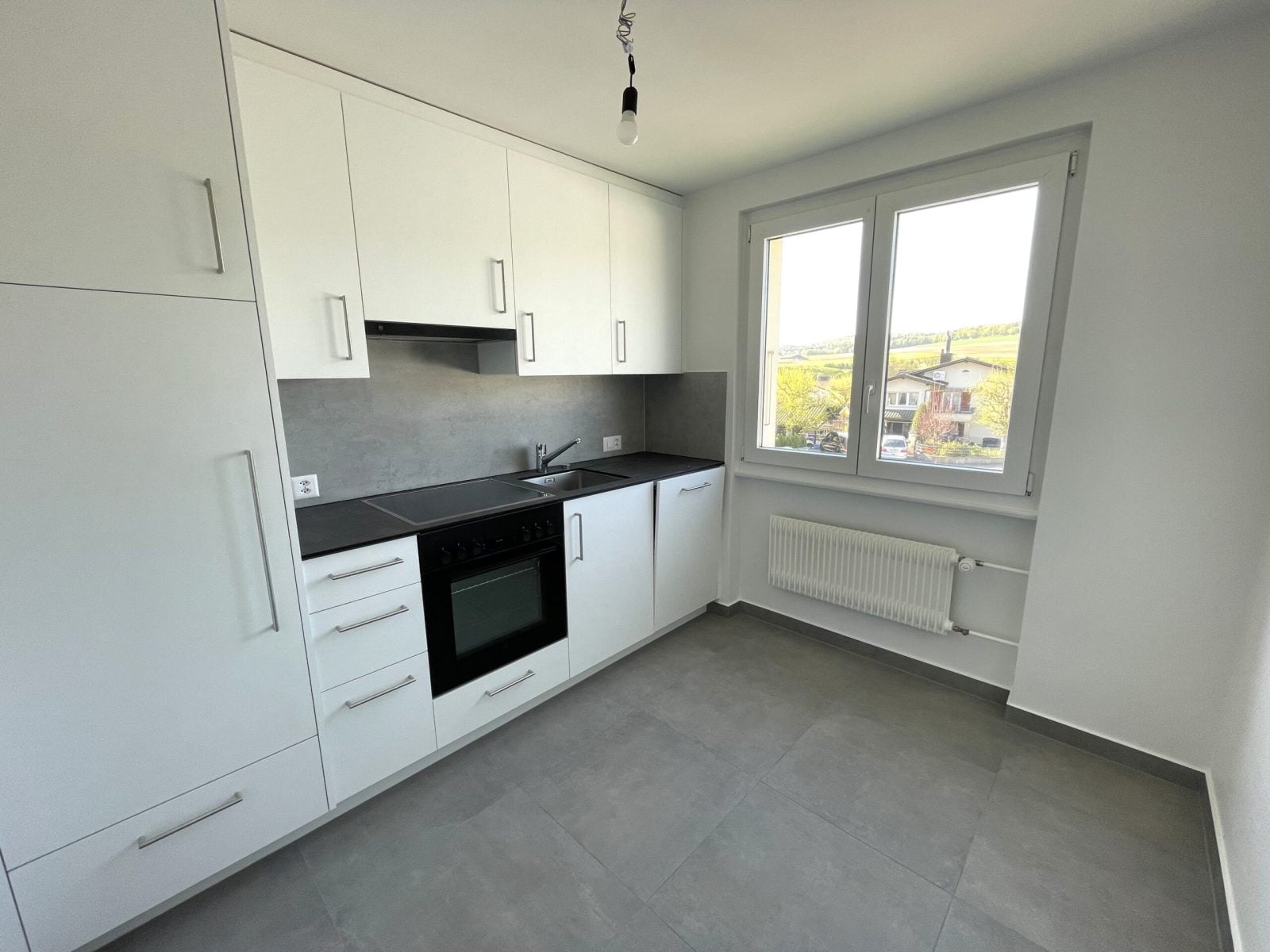 Appartement de 4 pièces entièrement rénové au 1er étage à Porrentruy - photo 4